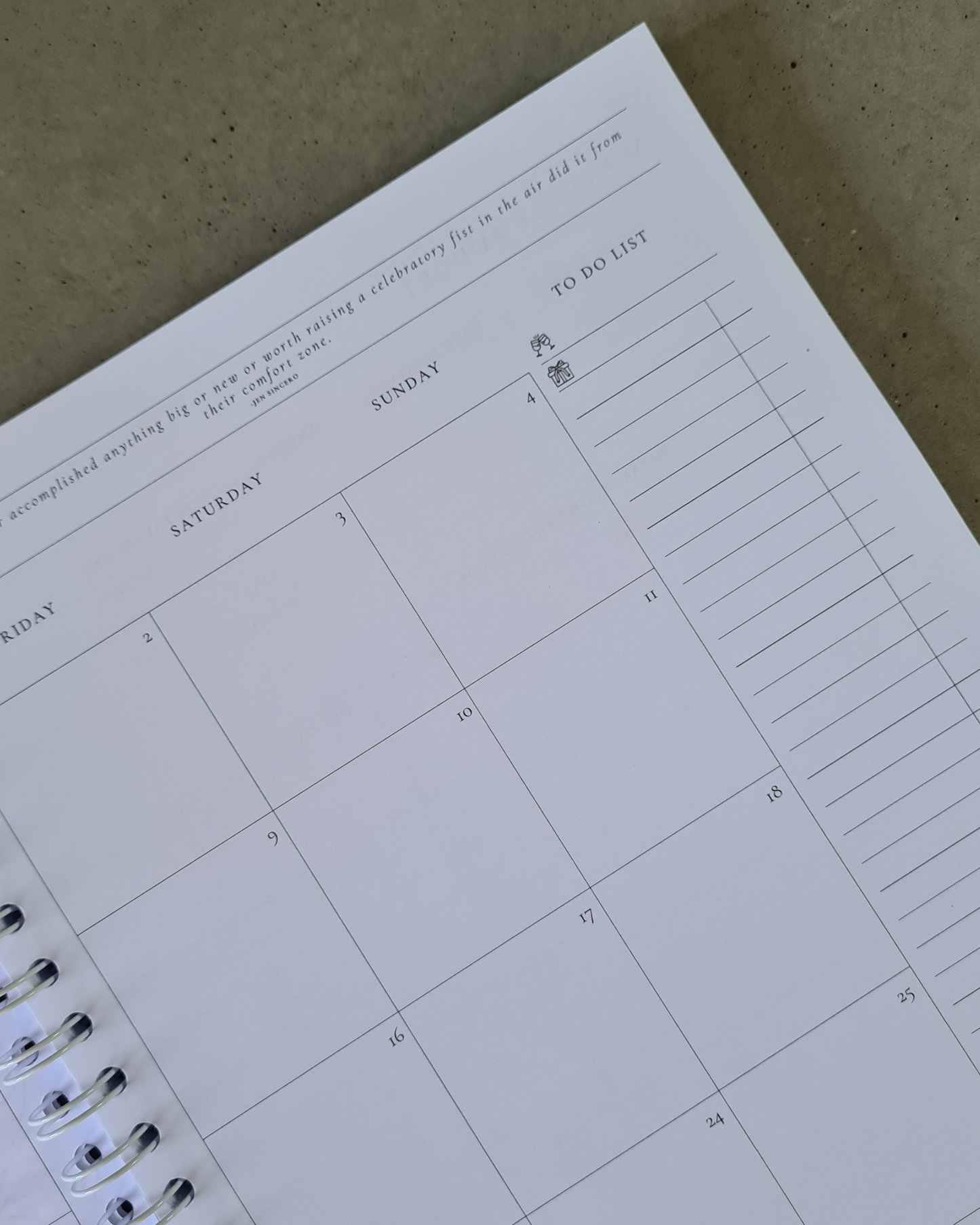 Calendar page with a to-do list on a textured surface