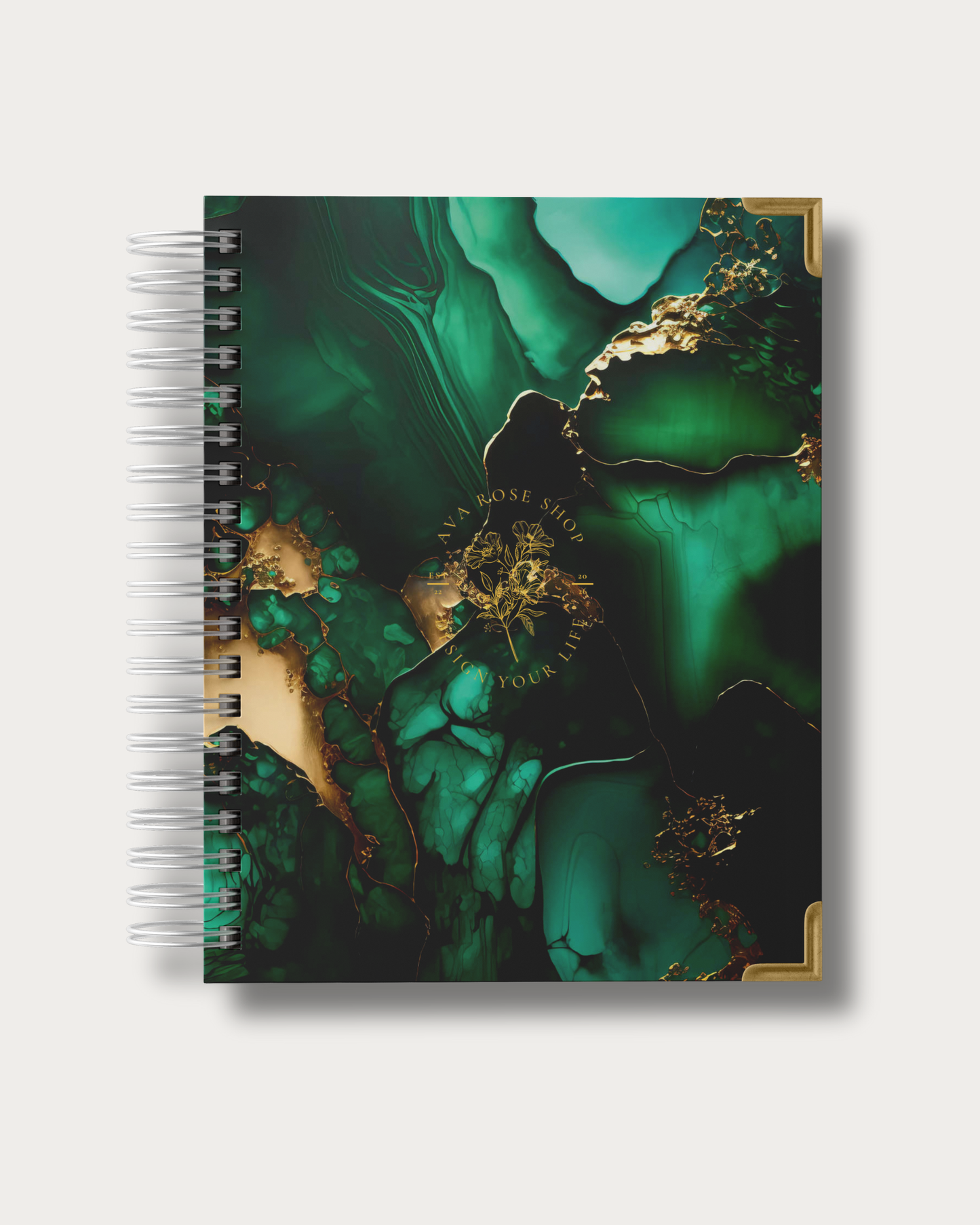 Planner with green and gold abstract design on a white background