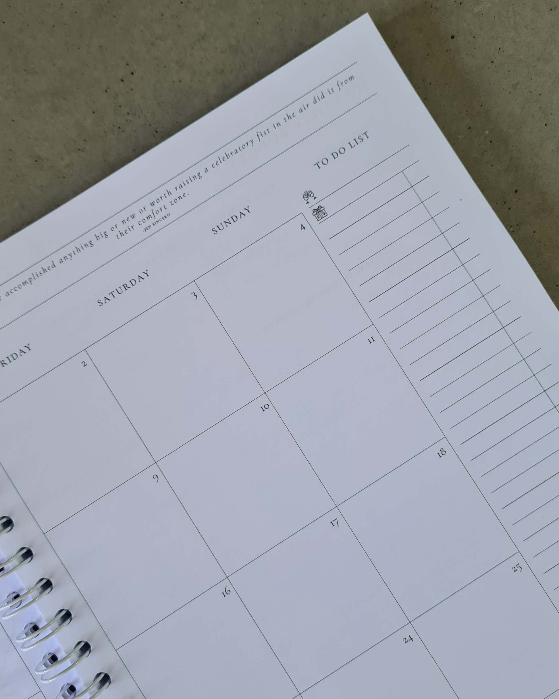 Calendar page with a to-do list on a textured surface
